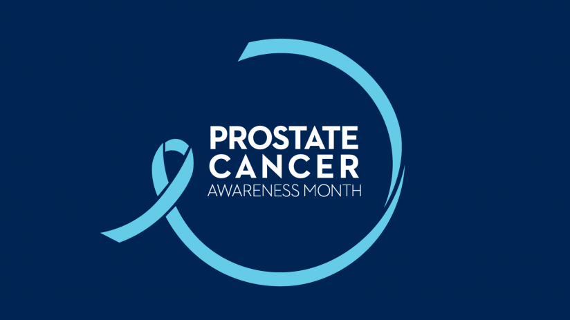 A blue ribbon encircles text that reads: "Prostate Cancer Awareness Month"