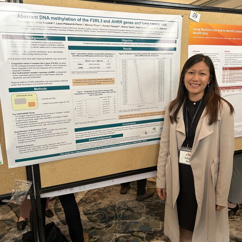 Dr. Vikki Ho poses with the CARTaGENE poster