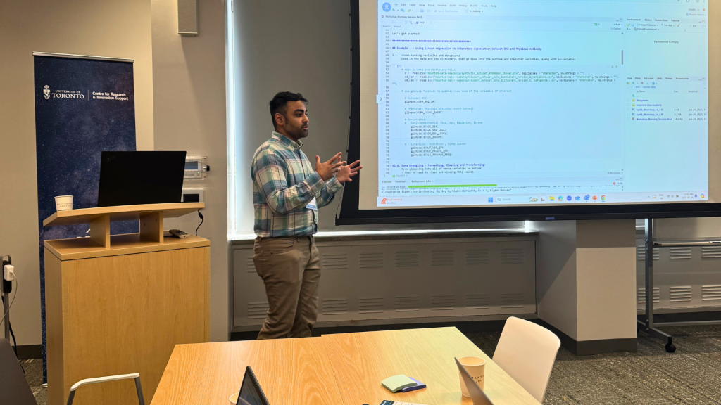 Sheraz presenting a slide.