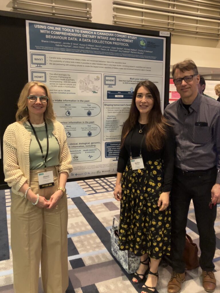 Rachel, Sharon and Benoit in front of a research poster